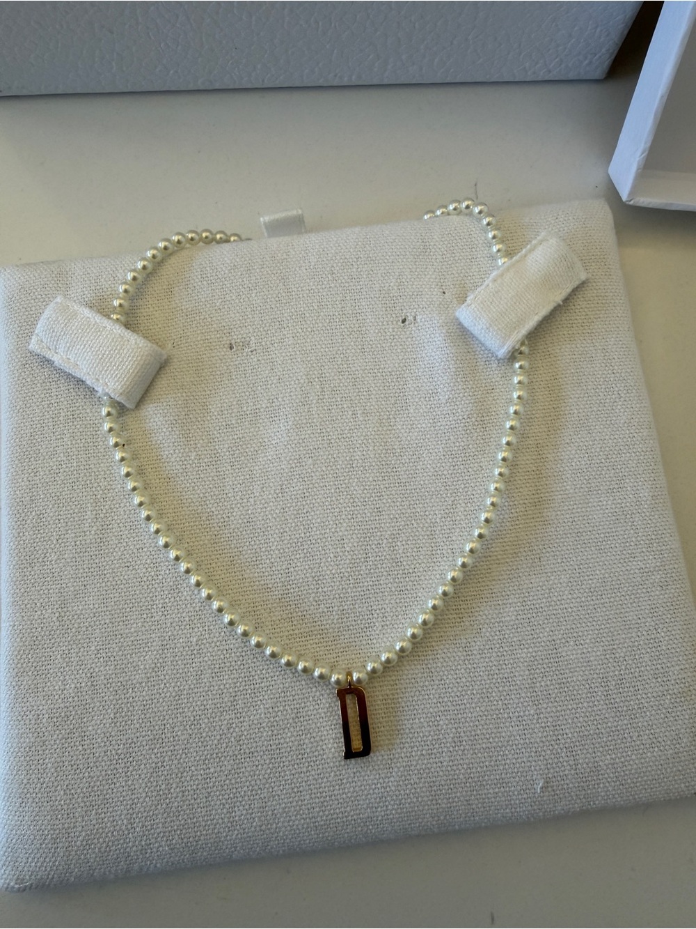 DIO(R)EVOLUTION NECKLACE Gold-Finish Metal and White Resin Pearls
